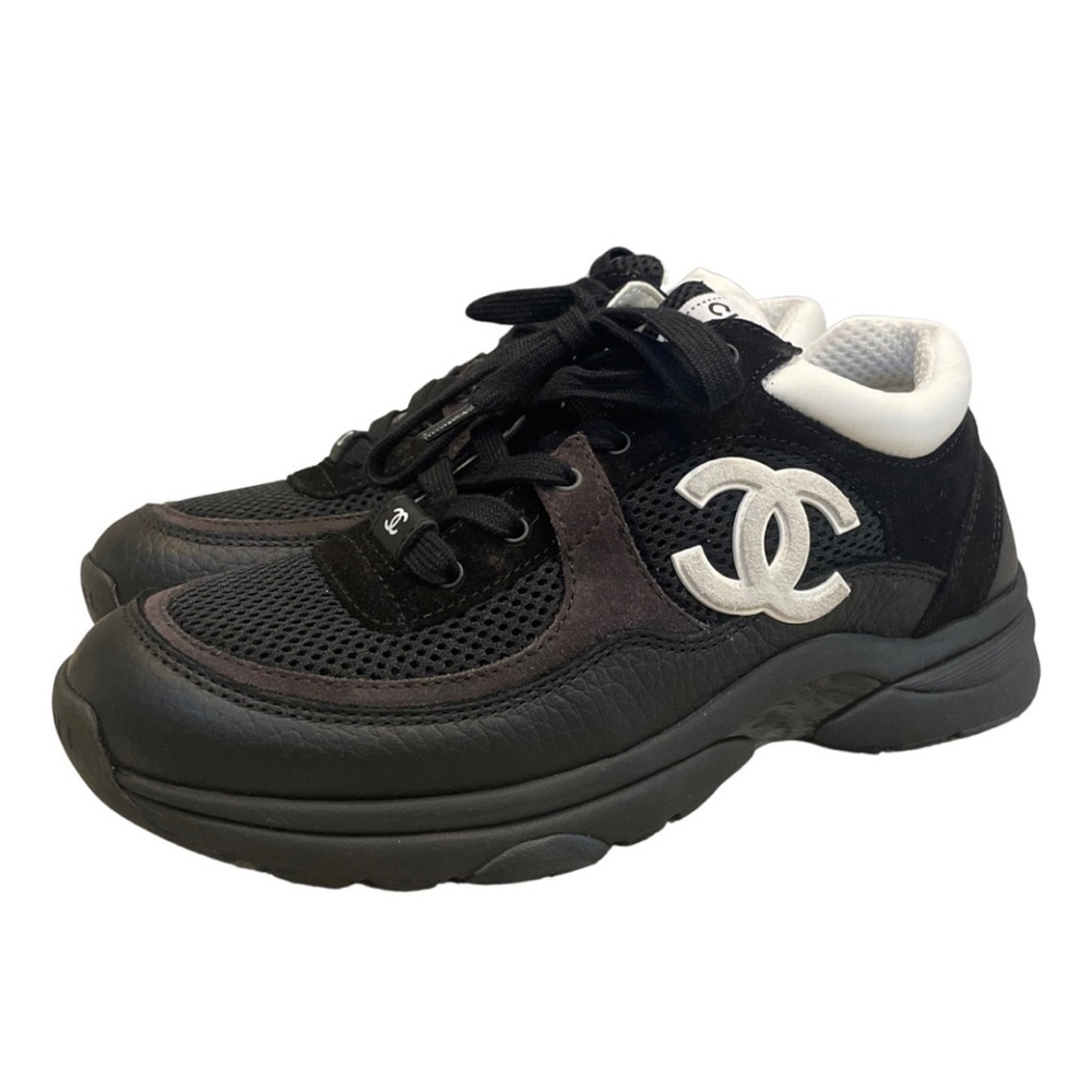 Authentic, never worn, pair of CHANEL
sneakers